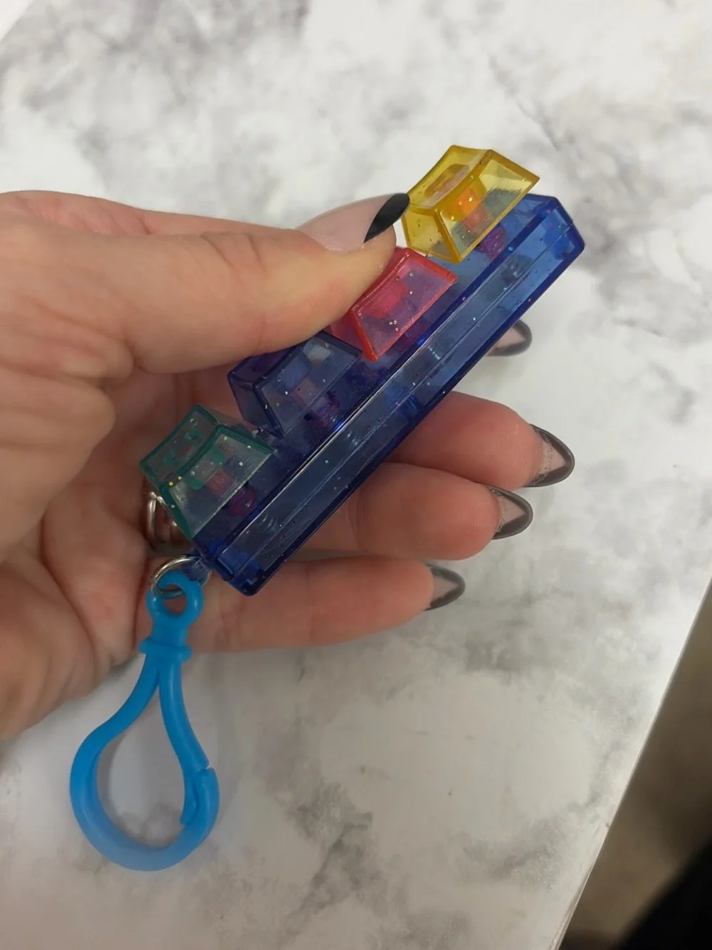 Colorful Mini Keyring Popper Toy - Blue Base with Multicolor Buttons